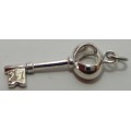 A Sterling Silver 21st Key with the Bow in the Shape of a Heart
