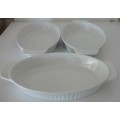 A trio of White oval Vegetable Serving Dishes