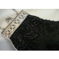 A Very Smart Black Beaded Evening Bag on Long Silver Coloured Chain