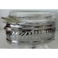 An Anchor Hocking Oval Casserole Dish in Stainless Steel Stand