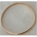 A Solid 9ct Yellow Gold Bangle