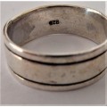 A Large Sterling Silver Wedding Ring