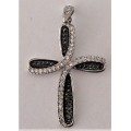 A Very attractive Sterling Silver Cross set with Black and White CZ's