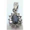 A  Very Elegant Small Sterling Silver Pendant set with an Oval Blue CZ and Tiny White CZs