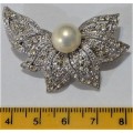 A Stunning Brooch set with a Simulated Pearl and Diamantes