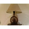 BEAUTIFUL LAMP WITH OX WAGON WEEL AS CENTRE PIECE, BLACK AND OLIEN WOOD BASE, NICE PIECE !!!