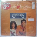 CARPENTERS (GREATEST 16 LOVE SONGS) - VINYL IN NEAR MINT CONDITION - SEE BELOW FOR INFO.
