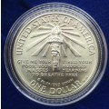 1986 United States of America Uncirculated Silver Dollar (900) encapsulated in box of issue with COA