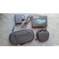 PSP, 5 games, charger and a PSP converter