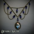Deviant South Sugar Skull Cabochon 18x25mm Bronze Necklace with Facetted Blue Beads