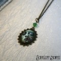Deviant South `I Am Smiling` Cabochon Bronze Necklace - Green Zombie Face