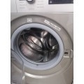 A dual washing machine tumble dryer WHIRLPOOL like new