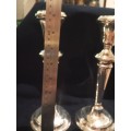 A large heavy pair of English candle sticks w
