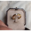 A  beautiful 18k gold ring set with single fine diamond
