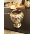 A beautiful repousse sterling mustard or jam pot