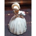A lovely Royal Doulton figurine Rag doll HN2142