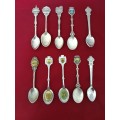 10 Collectable spoons  + 18 spoon display case - as per pictures