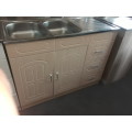 Kitchen  cabinets with sink and tap