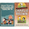 FOUR CHARLIE BROWN PAPERBACKS BY CHARLES M SCHULZ