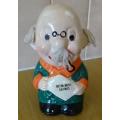 VINTAGE OLD MAN PIGGY BANK WITH YARN HAIR. RETIREMENT FUND