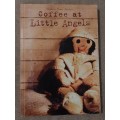 Coffee at Little Angels - Author: Nadine Rose Larter