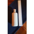 Collectable Stone Bottle (empty) with stopper.  No label. Grey White colour with no label.