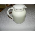 Vintage insulated White cold/hot water jug with handle and insulated glass lined interior.