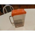 Vintage Plastic Milk or fruit juice carton container/pourer. Orange flip lid with spout and handle.