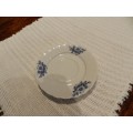 Delft Blauw hand painted Saucer. Made in Holland.  White with blue floral design.