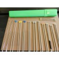 Vintage collection of knitting needles in holder. 12x Pairs of metal and aluminium (aero) knitting