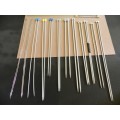 Vintage collection of knitting needles in holder. 12x Pairs of metal and aluminium (aero) knitting