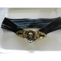 Ladies Funky belt. Black Leather belt with large lions head buckle.