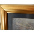 Picture Frame: Gilt frame with Mountain scene print in blue behind glass.