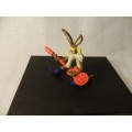 Vintage Warner Bros. Cartoon characters: Wile E Coyote playing guitar. PVC figure.