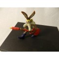 Vintage Warner Bros. Cartoon characters: Wile E Coyote playing guitar. PVC figure.