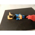 Vintage Warner Bros. Cartoon characters: Daffy Duck smashing a guitar. PVC figure