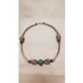 Vintage Costume Jewellery: Choker Necklace with silver tubes and green and brown porcelain beads.