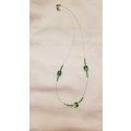 Vintage Costume Jewellery:  Wire necklace strung with green glass and African beads.