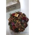 Vintage Christmas decoration. Candle holder wreath decorated with pine cones