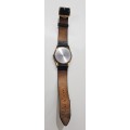 Vintage Mens watch / Astro Quartz.  c1970s.  Gold plated, round face with black leather strap.