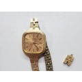 Ladies Seiko Quartz wrist watch. c1980s.  Gold plated with square face and original strap,