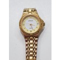 Ladies Lanko Quartz wrist watch. c1990s.  Gold plated with round face and original strap and clasp.