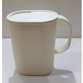 Vintage Tupperware.  1x Jug oval (colourless/see through) with secure cream coloured lid.