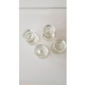 Set of 4x Pedestal type Glass Candle Holders. Round base