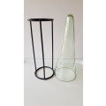 Glass Flower vase. Large glass vase, funnel shaped and mounted on smooth round wrought iron base.