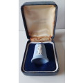 A collectors thimble in blue jasperware by Wedgewood in original presentation box.