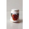 A Vintage collectors thimble. Thimble has two painted butterflies