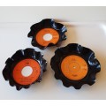 Novelty coasters made of Vinyl records. Set of 3x records: All with Orange labels