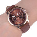 BEAUTIFUL BROWN GENEVA ROMAN NUMERAL ANALOG QUARTZ  WATCH WITH RED FAUX LEATHER