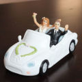 GORGEOUS AND RARE SOLID RESIN WEDDING/ENGAGEMENT/ANNIVERSARY CAKE TOPPER - BRIDE AND GROOM IN CAR